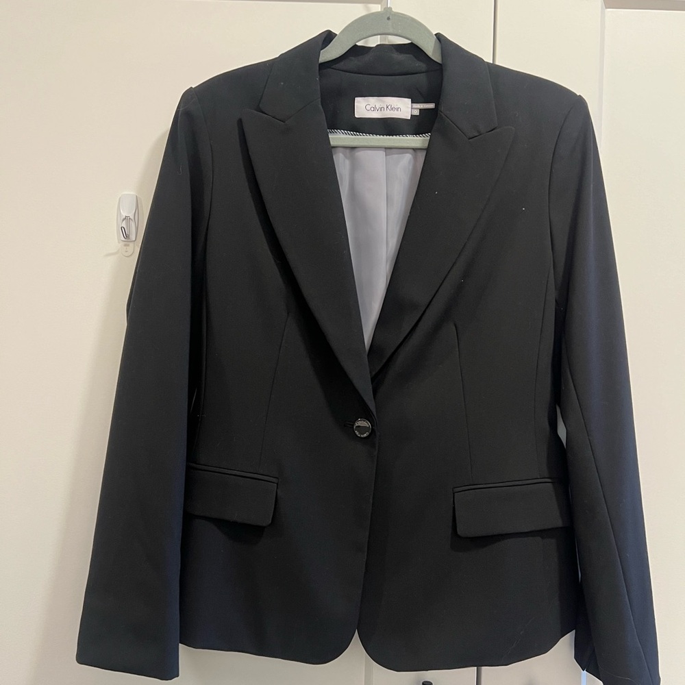 Black Calvin Klein woman’s suit jacket